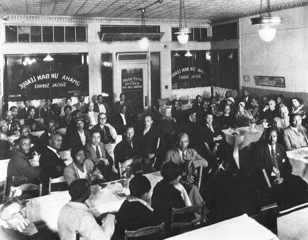 African American men and women gather at the Omaha Urban League